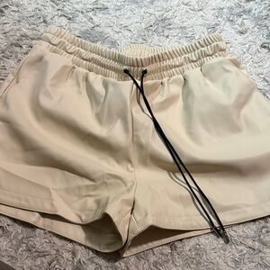 Bella Marie Beige Athletic Shorts with Black Drawstring